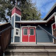 Langham Court Theatre entrance with bright red doors